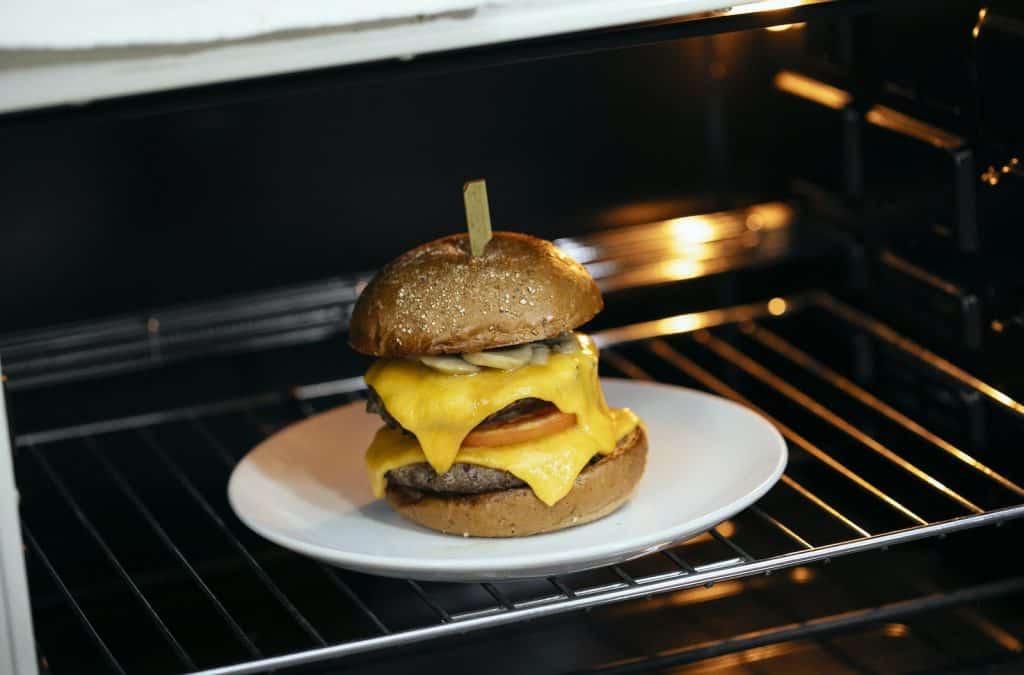 Appetizing burger in hot oven